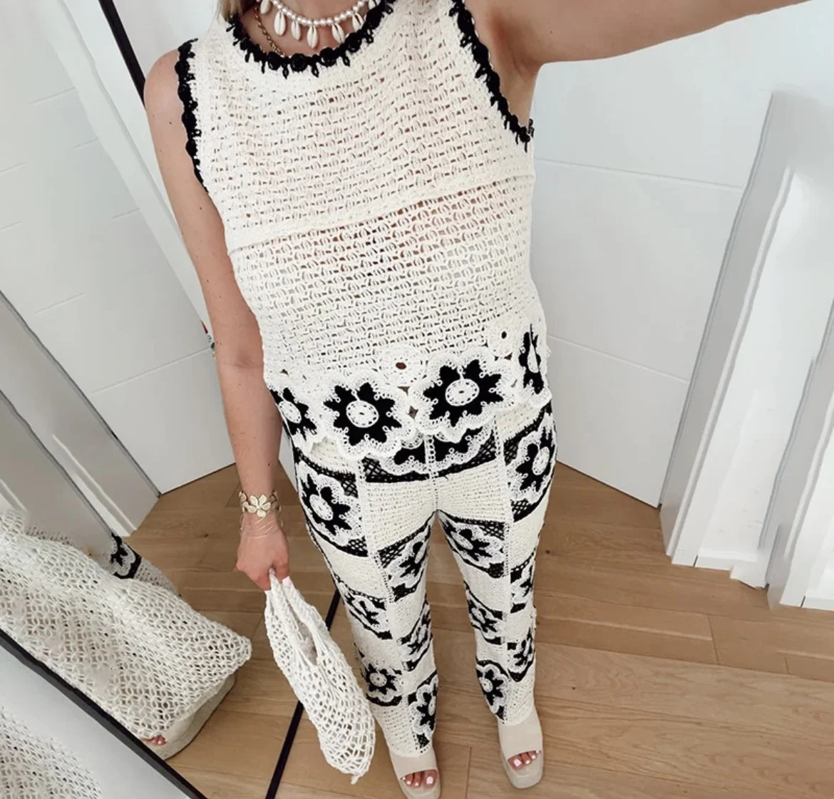 Autumn European and American style crocheted sleeveless top contrasting color knitted wide leg pants fashion set 250402