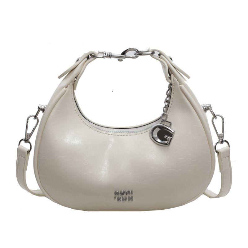 2025S Designer Women S Bag Small Silver Crescent Shaped With Niche Design New Korean Fashion Handbag Casual Versatile Shoulder Crossbody Bag