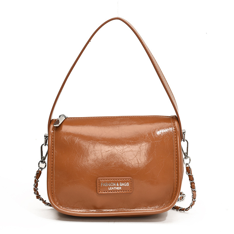 2025S Designer Women S Bag Handheld Women S New Urban Minimalist Crossbody Bag Single Shoulder Casual Commuting Texture Fashionable Small Square Bag