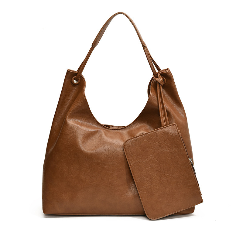 2025S Designer Women S Bag New Large Capacity Bucket Fashionable And Versatile Casual Commuting Tote Bag Niche Single Shoulder Armpit Bag