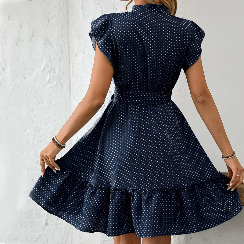 Womens elegant polka dot short sleeved A-line dress for beach vacation in spring and summer womens O-neck lace button midi dress 250402