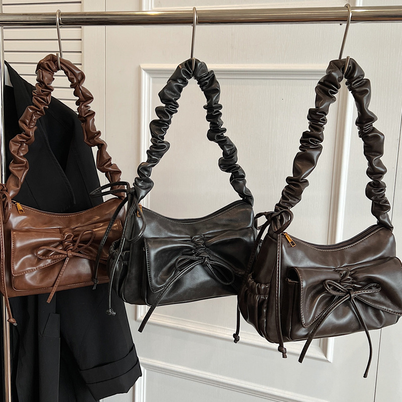 2025S Designer Women S Bag Pleated Armpit Women S New Fashionable Commuting Shoulder Bag High End Sense Niche Bow Crossbody Bag