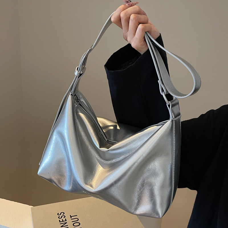 2025S Designer Women S Bag Autumn And Winter Handheld Tote Premium Oil Feeling Wax Leather Underarm Bag Niche Fashion Texture Single Shoulder Crossbod