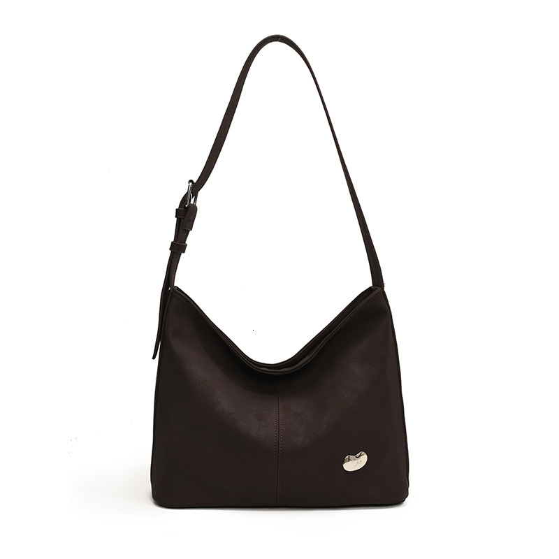 2025S Designer Women S Bag New Shoulder Niche Simple Solid Color Tote Versatile Commuting Lightweight Large Capacity Armpit Bag