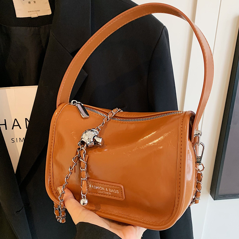 2025S Designer Women S Bag Handheld Women S New Urban Minimalist Crossbody Bag Single Shoulder Casual Commuting Texture Fashionable Small Square Bag