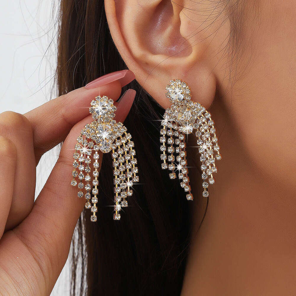 Hot selg new exaggerated tassel rhie earrings, urious and elegant women's fashionable earrings