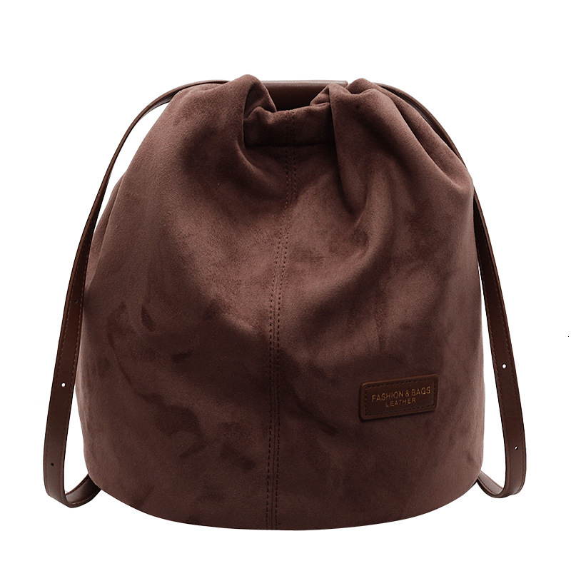 2025S Designer Women S Bag Korean Niche Bucket Bag Lightweight Commuting Drawstring Backpack Versatile Simple Design Large Capacity Casual Backpack