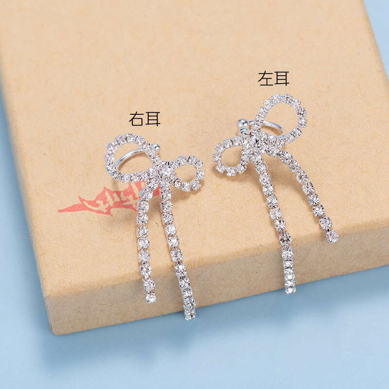 Yang Kaiwen's high-end butterfly bow tassel are versatile for women, with sparkg dia studded earrings