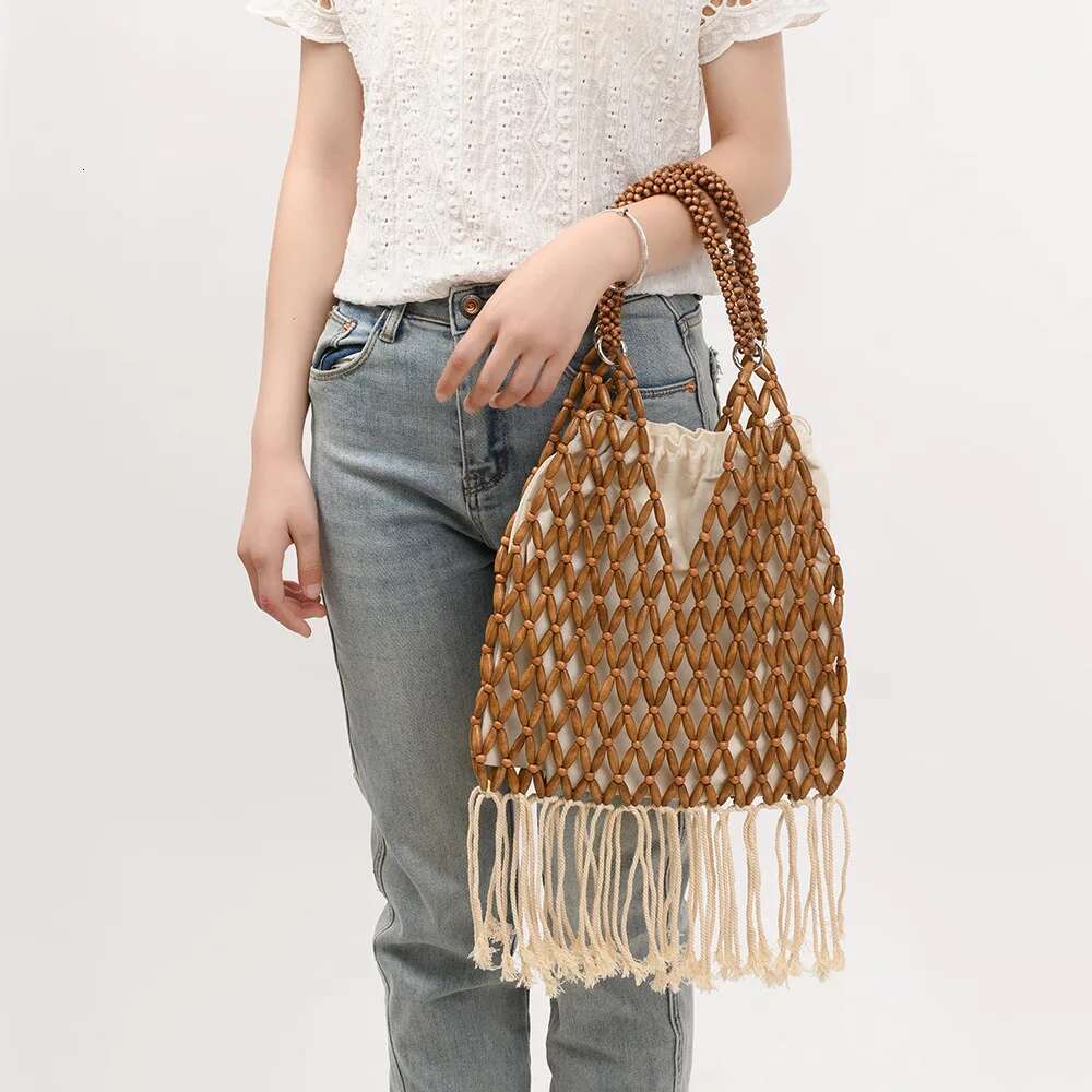 NEW Women Woven Tassels Design Hollow-Out Wooden Bead Tote Bucket Shoulder Bag Female Reticulate Netted Canvas Beach Handbag