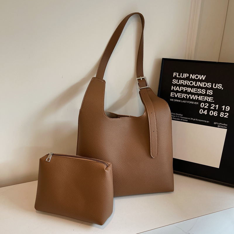 2025S Designer Women S Bag Women S New Large Capacity Handheld Mother Solid Color Simple Texture Underarm Shoulder Bag