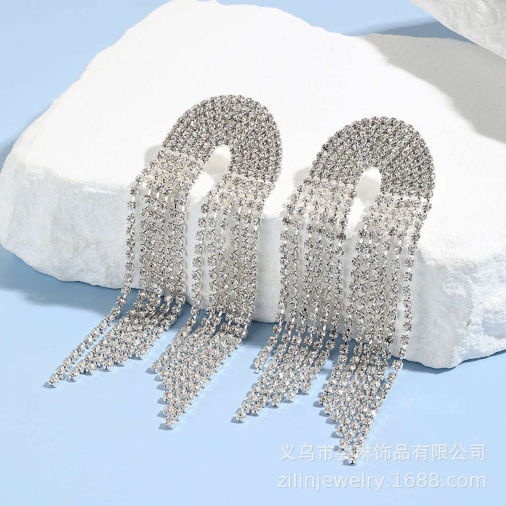 Hot selg with exaggerated high-end feel, light claw chain earrings, long rhie tassels, personalized girl earrings