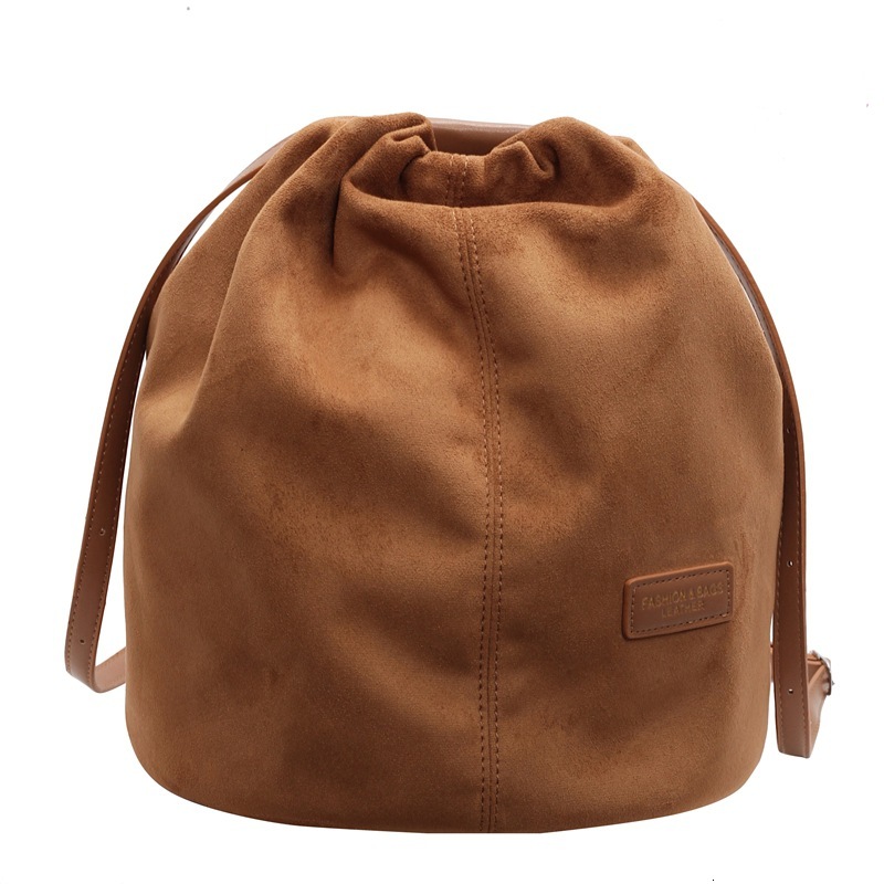 2025S Designer Women S Bag Korean Niche Bucket Bag Lightweight Commuting Drawstring Backpack Versatile Simple Design Large Capacity Casual Backpack