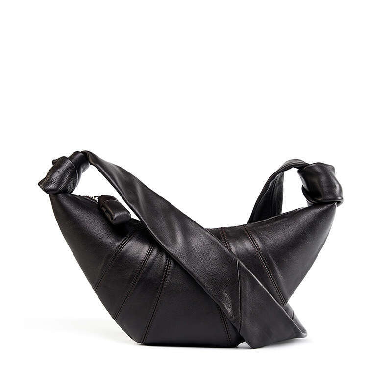 Design sense: French niche top layer lambskin croissant, lazy feeg, cow horn one shoulder diagonal cross dumpg bun, women's 2025 new style, uniqu