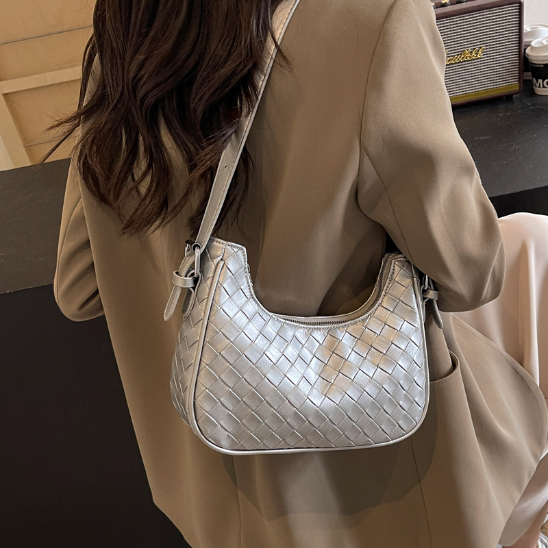 2025S Designer Women S Bag This Year S Popular Hand Held Woven Women S New And Fashionable Versatile Shoulder Commuting Simple Armpit Bag