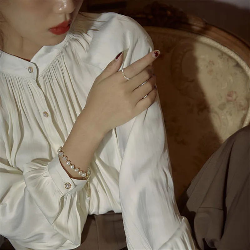 Womens shirt with white lantern sleeves retro pleated satin shirt summer autumn long sleeved loose office womens top 250402