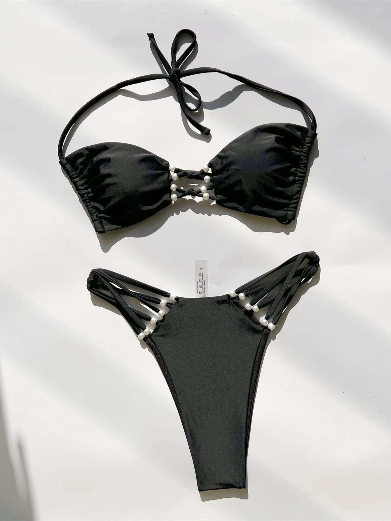 Dongdumaoyi Sexy Hollow Out Backless Thong Bikini Women Black Pearls Push Up Bandage Micro Swimsuit Summer Beach Bathing Suit Swimwear