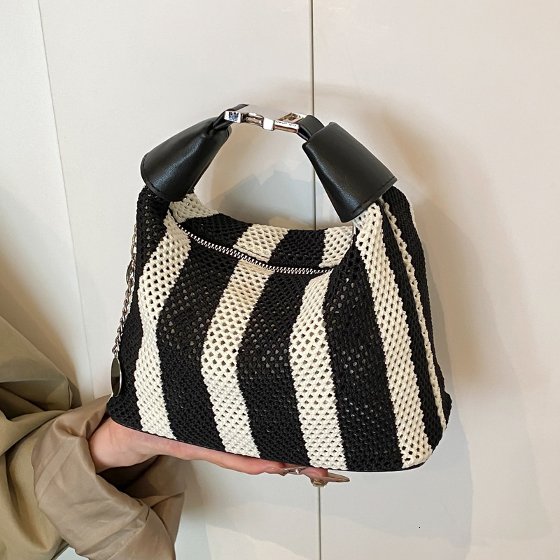 2025S Designer Women S Bag Summer Bucket Bag High End Exquisite Women S New Black And White Striped Hand Held Armpit Bag