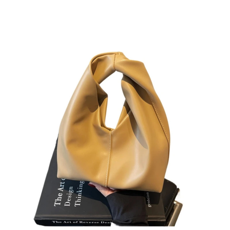 pleated fashionable solid color cloud bag simple and elegant soft leather handheld garbage bag 250402