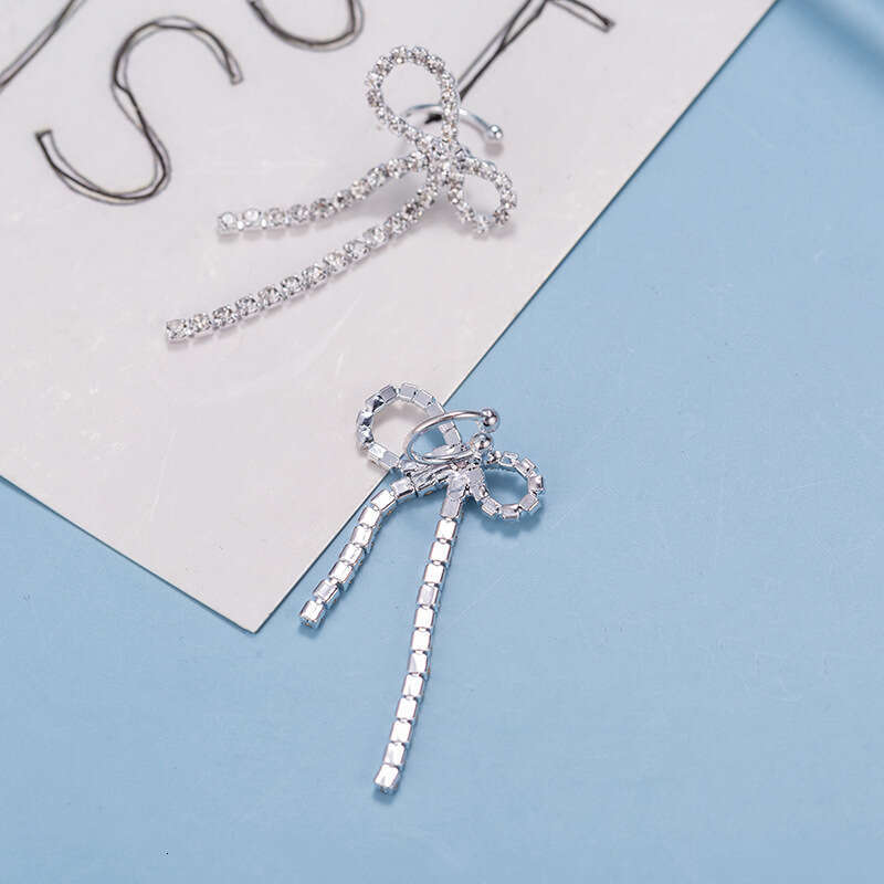 Yang Kaiwen's high-end butterfly bow tassel are versatile for women, with sparkg NEW dia studded earrings