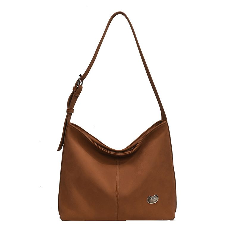 2025S Designer Women S Bag New Shoulder Niche Simple Solid Color Tote Versatile Commuting Lightweight Large Capacity Armpit Bag