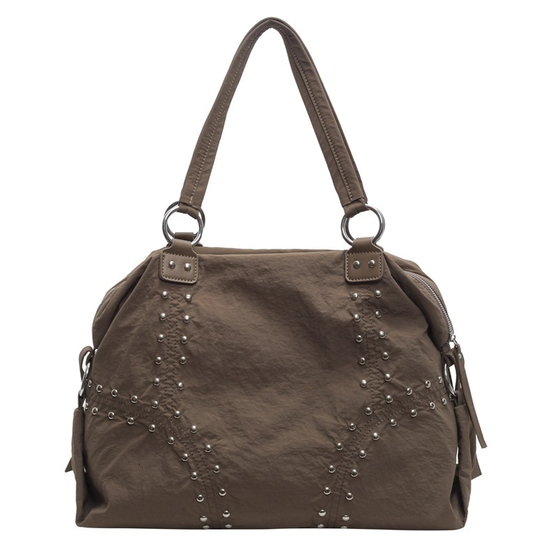 2025S Designer Women S Bag Autumn Popular Soft Cloth Rivet Shoulder Fashionable Large Capacity Tote Bag Casual Versatile Commuting Armpit Bag