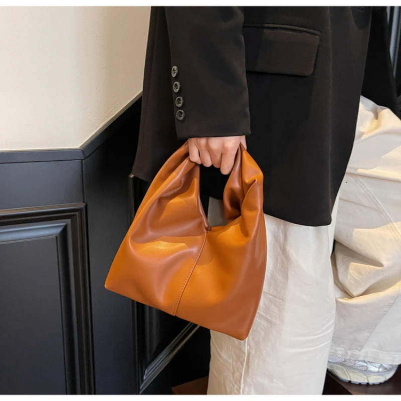 pleated fashionable solid color cloud bag simple and elegant soft leather handheld garbage bag 250402