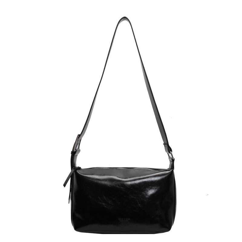 2025S Designer Women S Bag Autumn And Winter Handheld Tote Premium Oil Feeling Wax Leather Underarm Bag Niche Fashion Texture Single Shoulder Crossbod