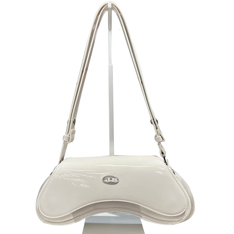 Internet Celebrity 2025 New Women's Fashionable Patent Leather Temperament Dingdang Spicy Girl Versatile Single Shoulder Armpit Hand-Held Crossbo