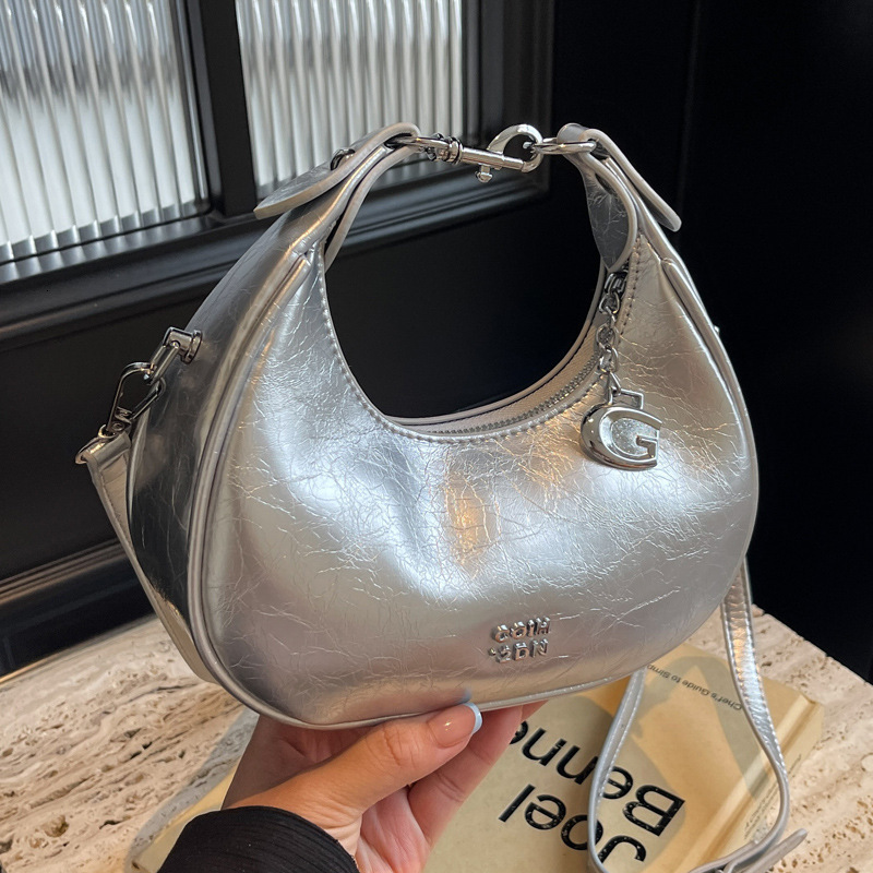 2025S Designer Women S Bag Small Silver Crescent Shaped With Niche Design New Korean Fashion Handbag Casual Versatile Shoulder Crossbody Bag