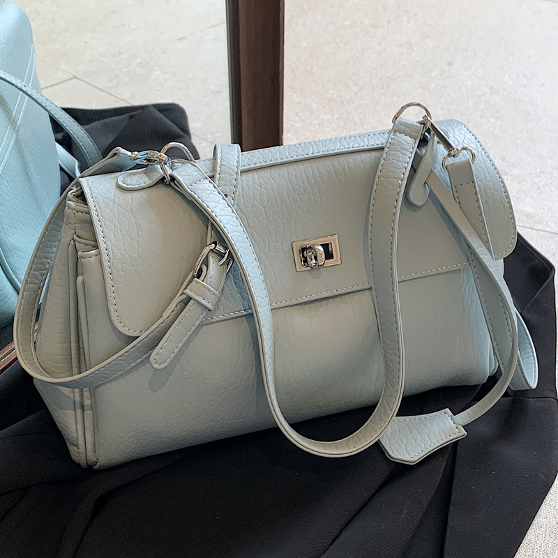 2025S Designer Women S Bag Korean Niche Hand Held Commuting Women S New Trendy Single Shoulder Kelly Large Capacity PU Crossbody Bag