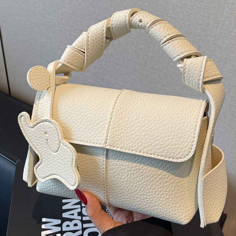 2025S Designer Women S Bag Premium Shoulder New Handheld Niche Eaves Work And Commuting Underarm Bag For Women