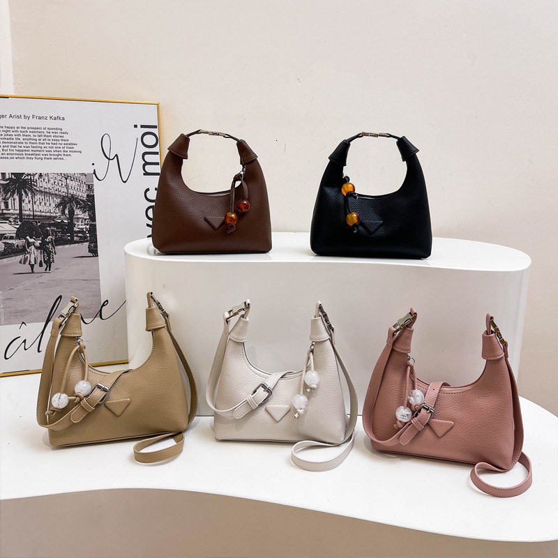 2025S Designer Women S Bag Simple Handheld Small For Women New Trendy Versatile Daily Matching Crossbody Solid Color Korean Dumpling Bag