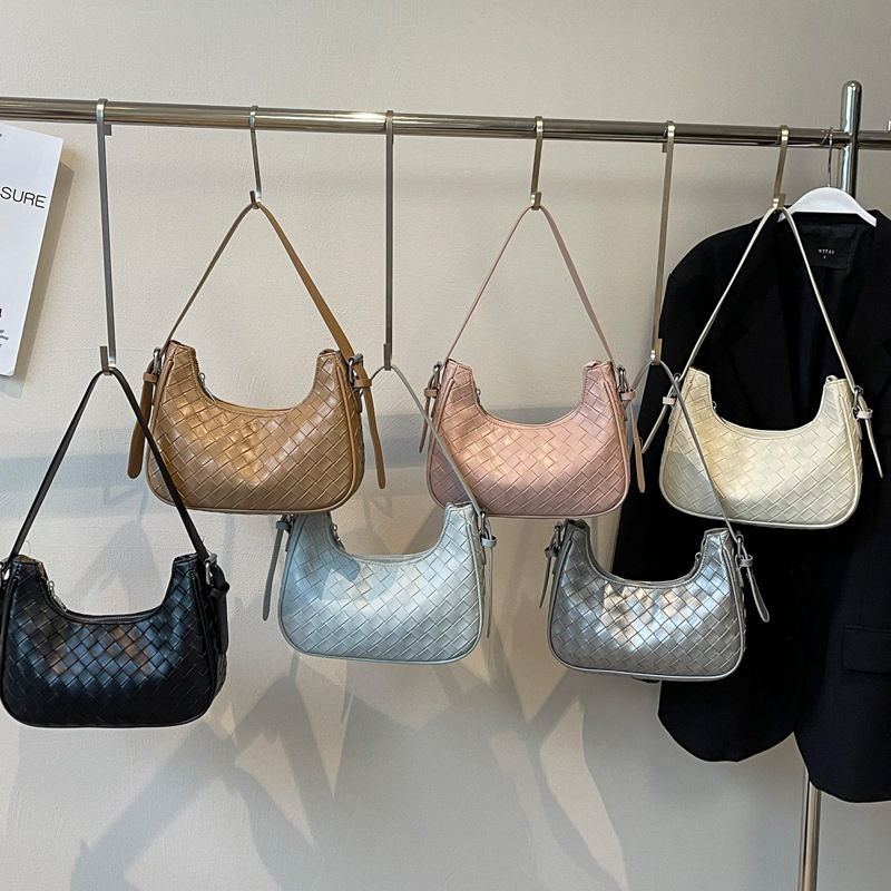 2025S Designer Women S Bag This Year S Popular Hand Held Woven Women S New And Fashionable Versatile Shoulder Commuting Simple Armpit Bag