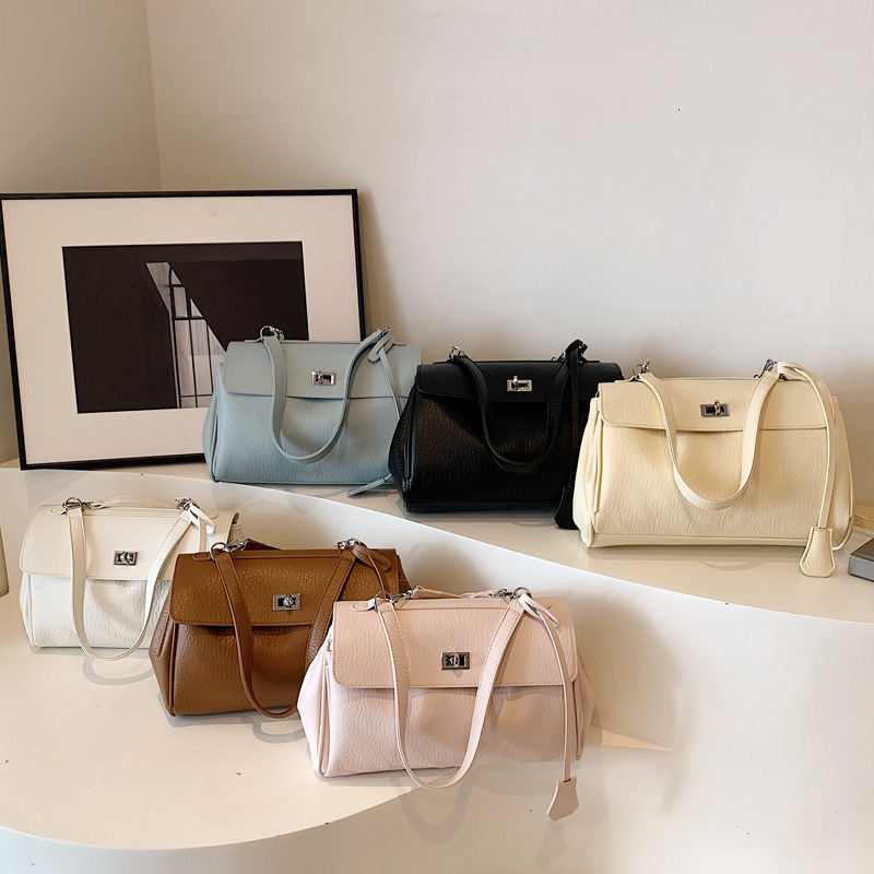 2025S Designer Women S Bag Korean Niche Hand Held Commuting Women S New Trendy Single Shoulder Kelly Large Capacity PU Crossbody Bag