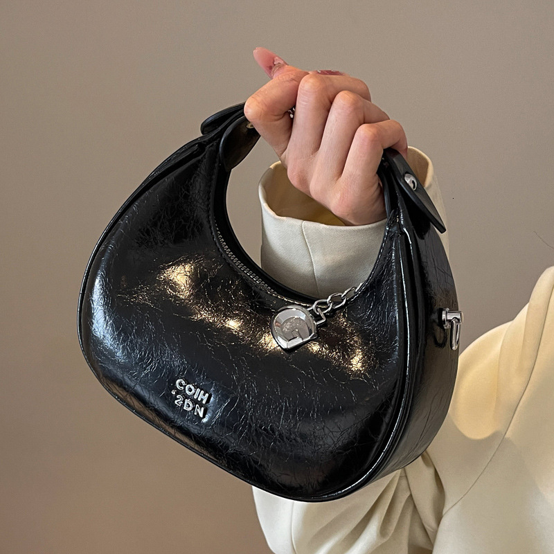 2025S Designer Women S Bag Small Silver Crescent Shaped With Niche Design New Korean Fashion Handbag Casual Versatile Shoulder Crossbody Bag