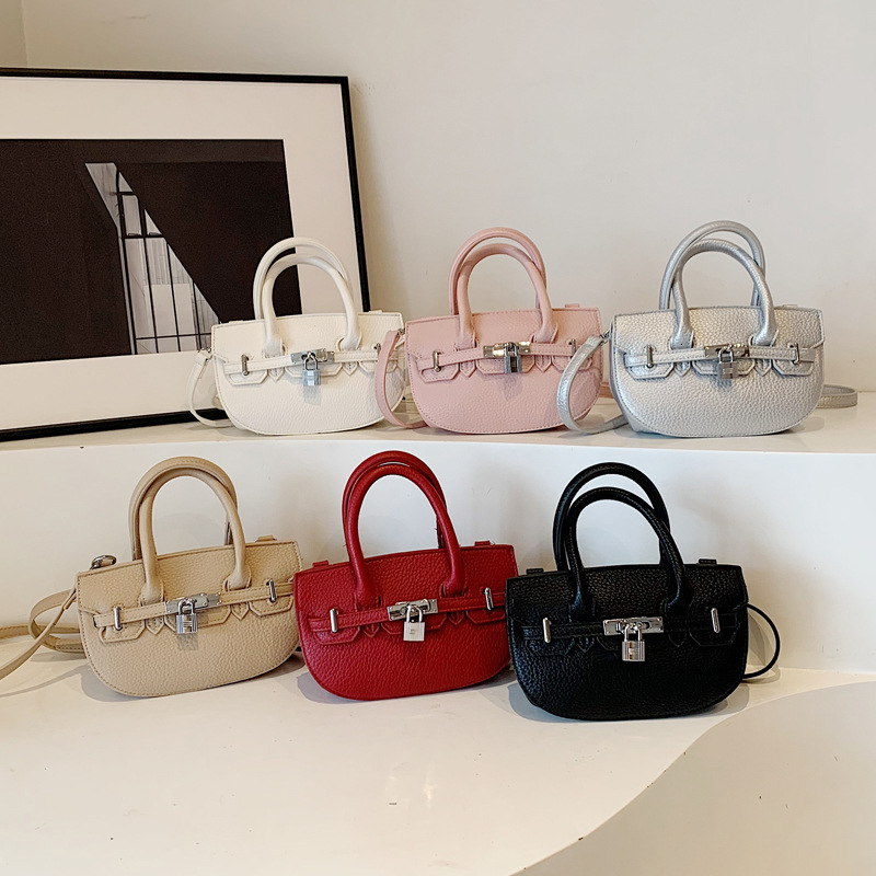 2025S Designer Women S Bag Handheld Kelly Women S Summer Versatile Light Luxury Commuting Oval Shoulder Bag High End Buckle Women Bags