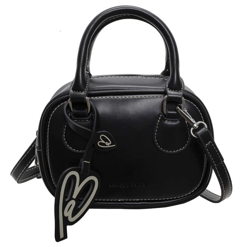 2025S Designer Women S Bag Simple Texture Toast Single Shoulder Women S Autumn New Fashion Versatile Crossbody Handbag Boston Bag
