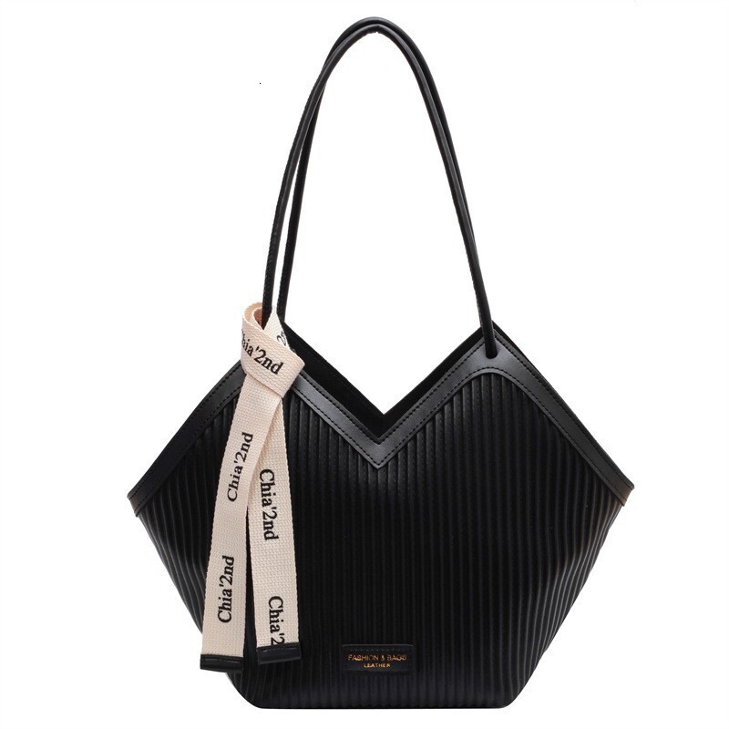 2025S Designer Women S Bag Women S Niche Design Versatile Shoulder Large Capacity Commuting Korean Version Fashion Handbag Texture Armpit Bag