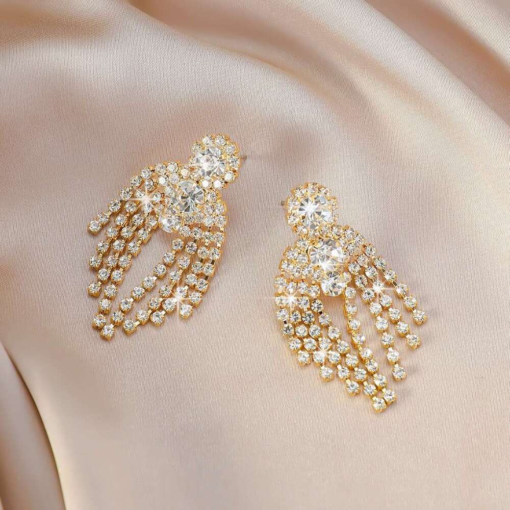 Hot selg new exaggerated tassel rhie earrings, urious and elegant women's fashionable earrings