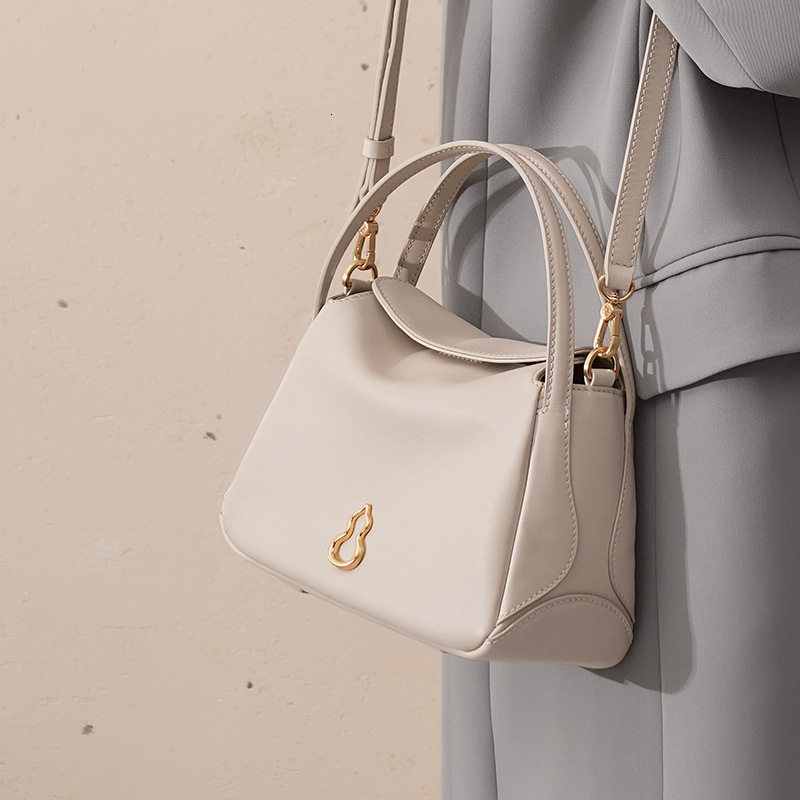 BAMPO Half Slope Perfect Head Layer Cowhide Small Basket Women's 2025 Spring New Handheld Crossbody Bag