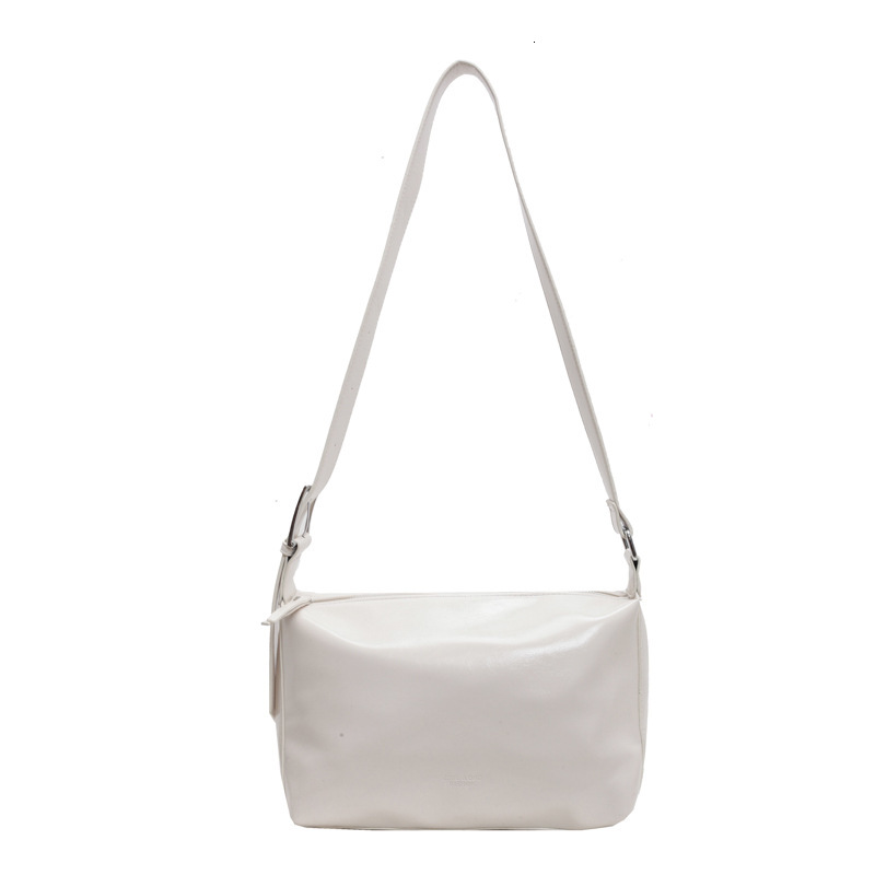 2025S Designer Women S Bag Autumn And Winter Handheld Tote Premium Oil Feeling Wax Leather Underarm Bag Niche Fashion Texture Single Shoulder Crossbod