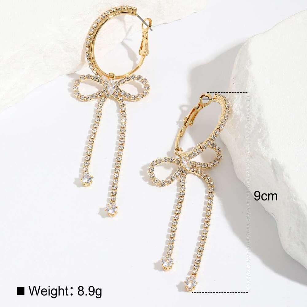 Korean socialite's urious and high-end style with dia studded bow, long tassel earrings, niche design, temperament, rhie earrings