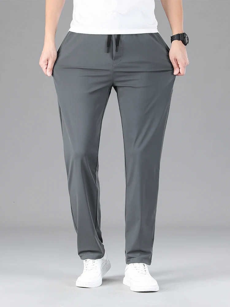 Mens clothing highquality casual pants summer thin ice silk straight stretch waist jogging sports mens Trouser 250403