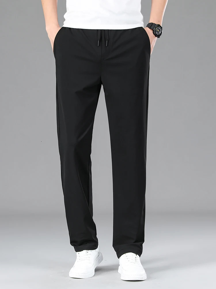Mens clothing highquality casual pants summer thin ice silk straight stretch waist jogging sports mens Trouser 250403