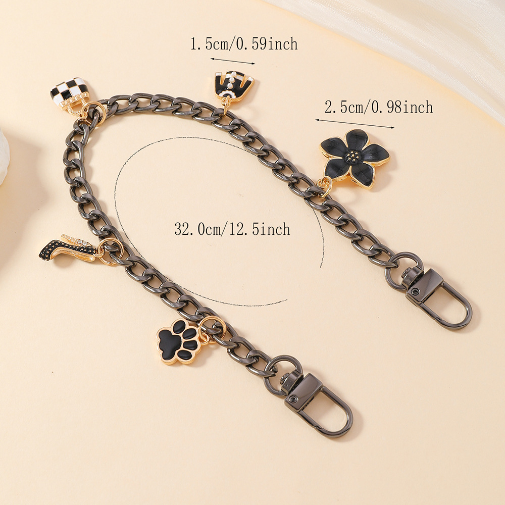 Luxury keychain designer Donkey Brand New Four-Leaf Clover Alloy Light Luxury Keychain Bag Pendant Wholesale Accessories key chain