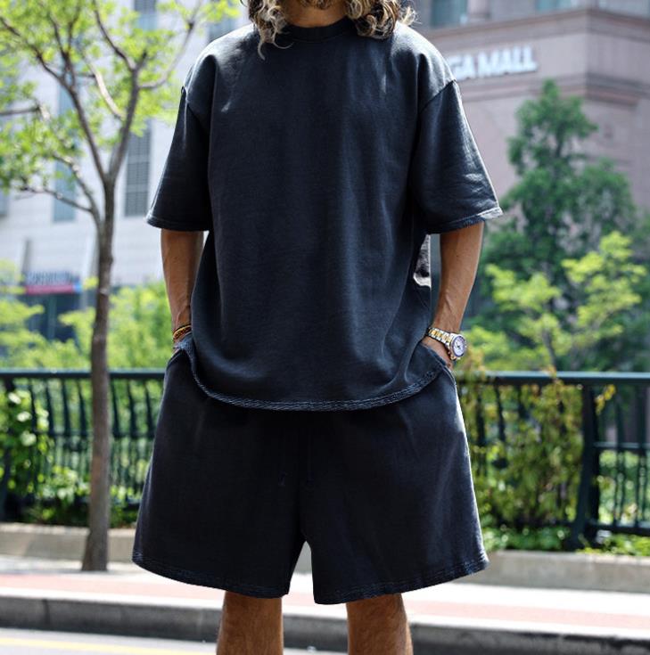 Crossing the border between Europe and United States with casual mens clothing in solid color loose short sleeved simple street trend style set 250326
