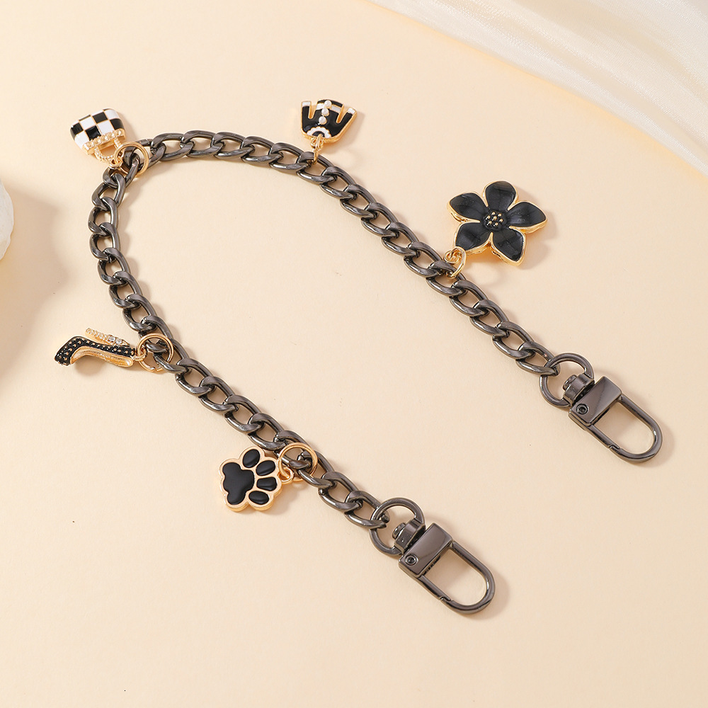 Luxury keychain designer Donkey Brand New Four-Leaf Clover Alloy Light Luxury Keychain Bag Pendant Wholesale Accessories key chain