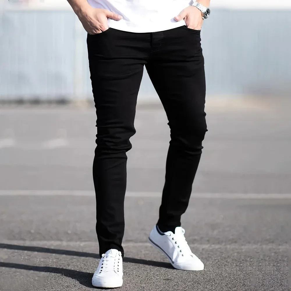 Spring mens black and blue pants solid color elastic jeans street casual slim fit tight 250408