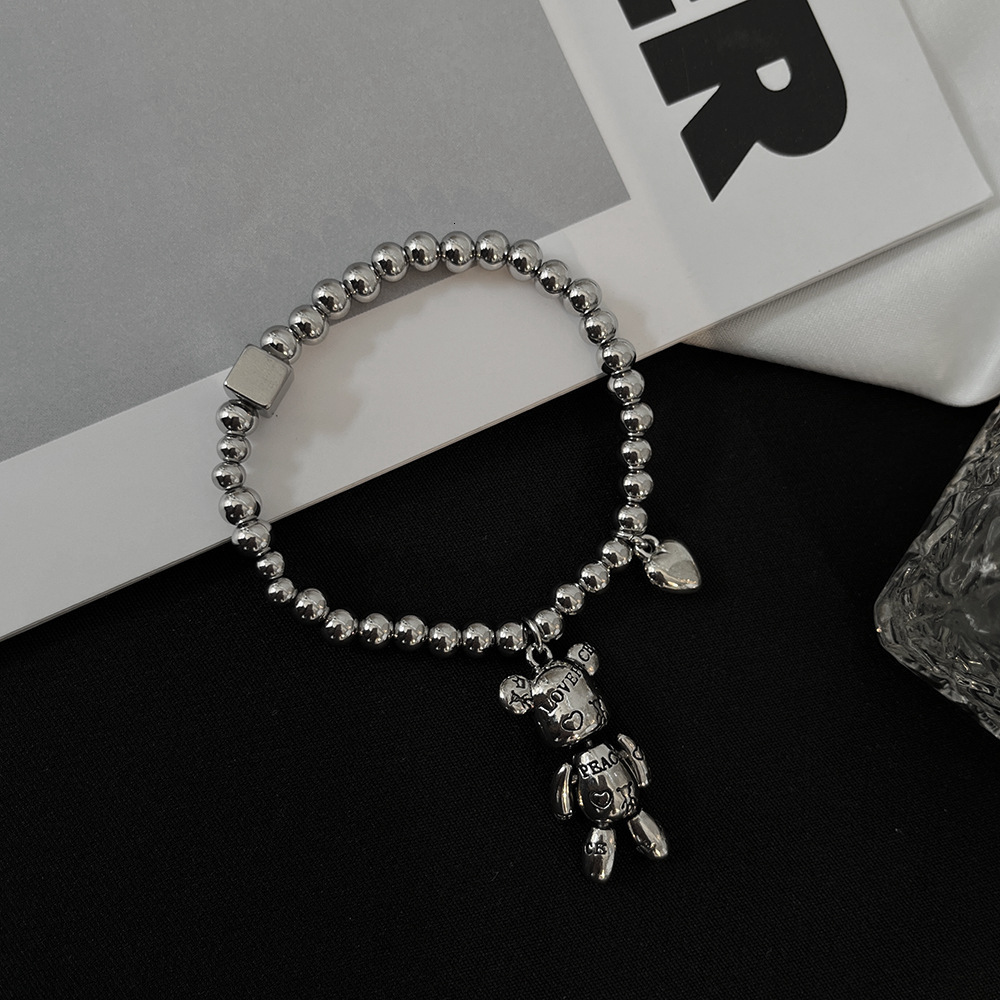 Love nical teddy bear stainless steel couple bracelet, niche high-end elastic rope bracelet