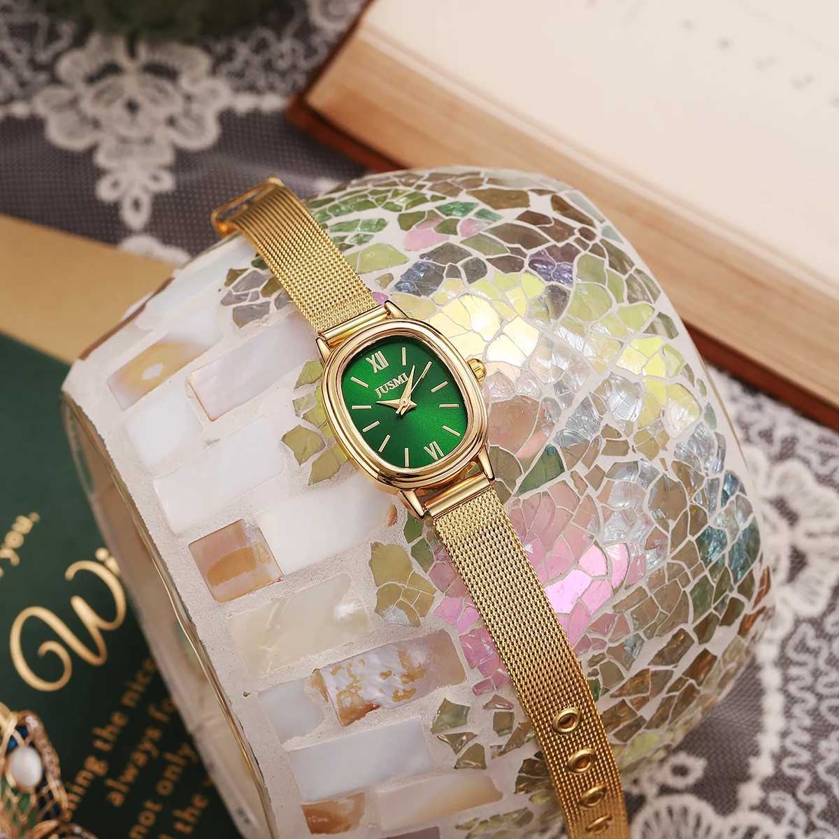Ladies new oval steel strap quartz watch with rectangular scale high-end atmosphere and fashion trend.T250408